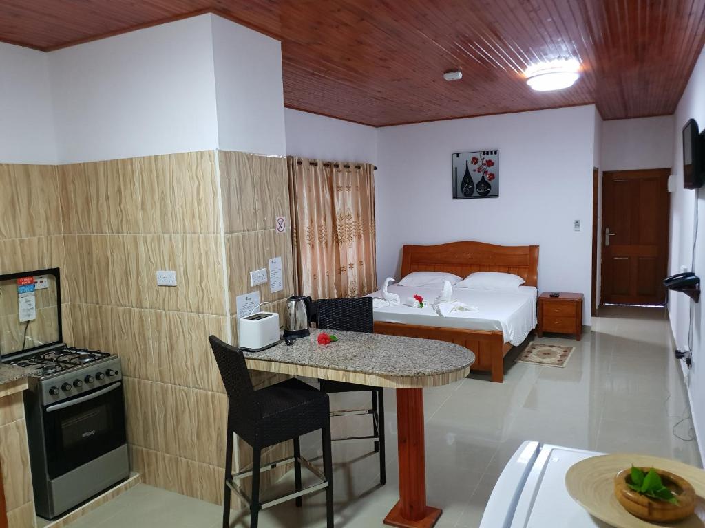 Kuchyň nebo kuchyňský kout v ubytování Tourterelle Holiday Home