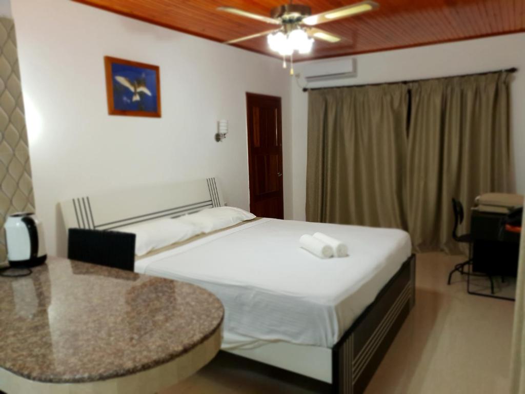 Postel nebo postele na pokoji v ubytování Tourterelle Holiday Home