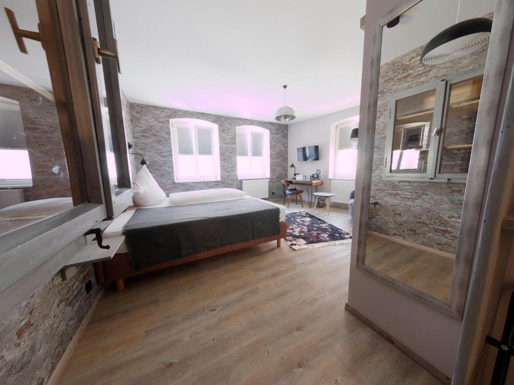Postel nebo postele na pokoji v ubytování Hotel - Weinbar FAHR AWAY