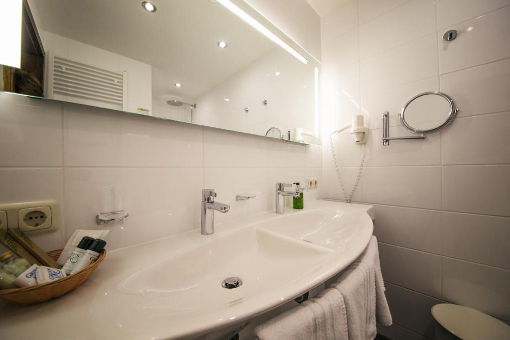 Koupelna v ubytování Hotel Grieshof