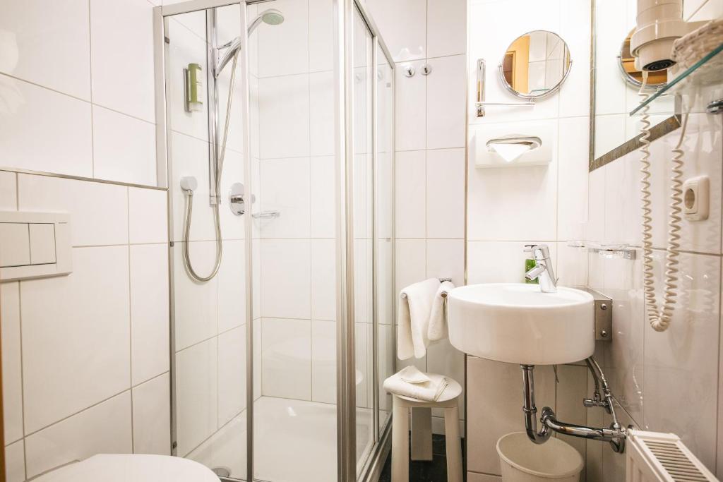 Koupelna v ubytování Hotel Grieshof