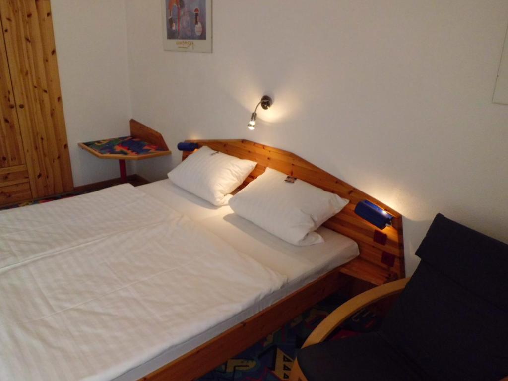 Postel nebo postele na pokoji v ubytování Smile Hotel