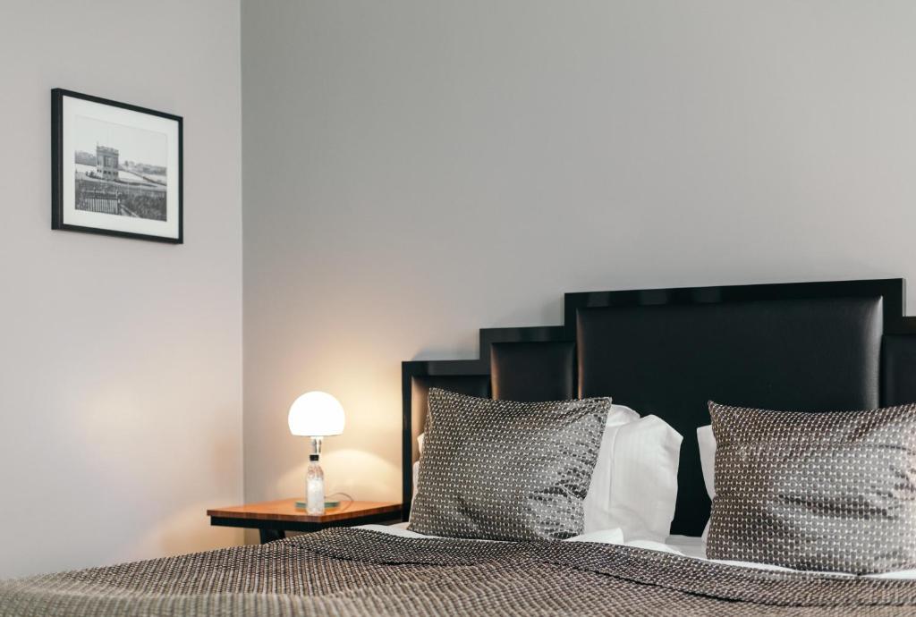 Postel nebo postele na pokoji v ubytování Hotel Borg by Keahotels