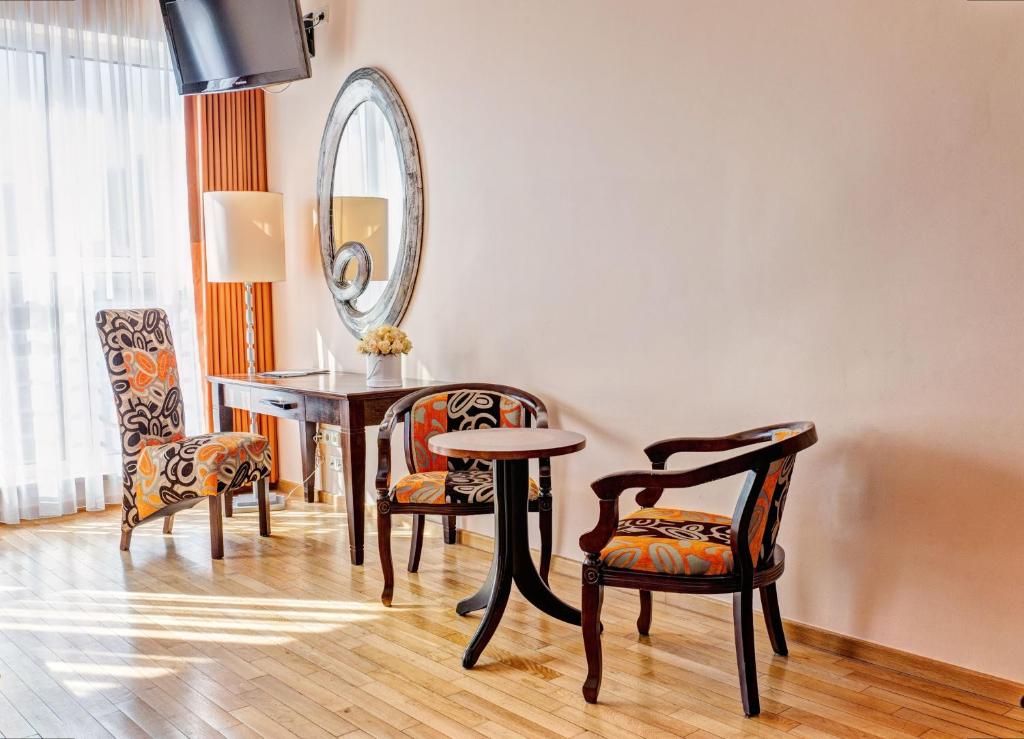 Ein Sitzbereich in der Unterkunft Don Prestige Residence