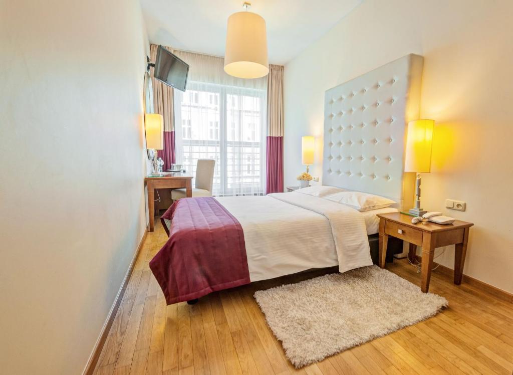 Posteľ alebo postele v izbe v ubytovaní Don Prestige Residence