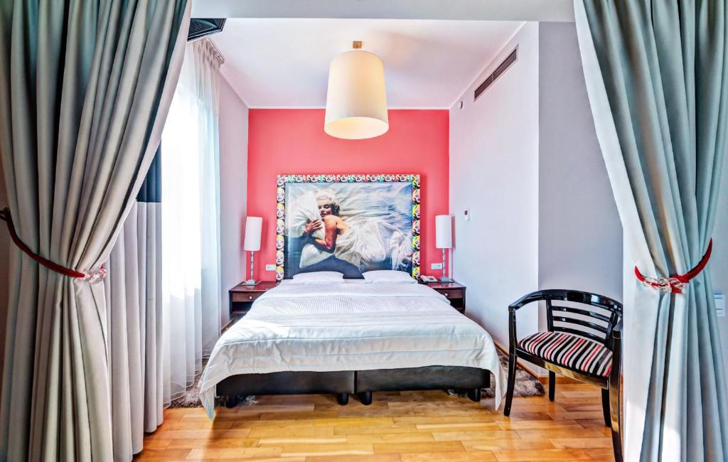 Ein Bett oder Betten in einem Zimmer der Unterkunft Don Prestige Residence