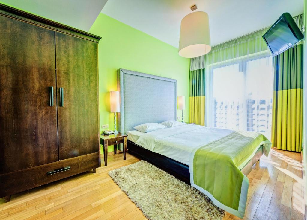 Posteľ alebo postele v izbe v ubytovaní Don Prestige Residence