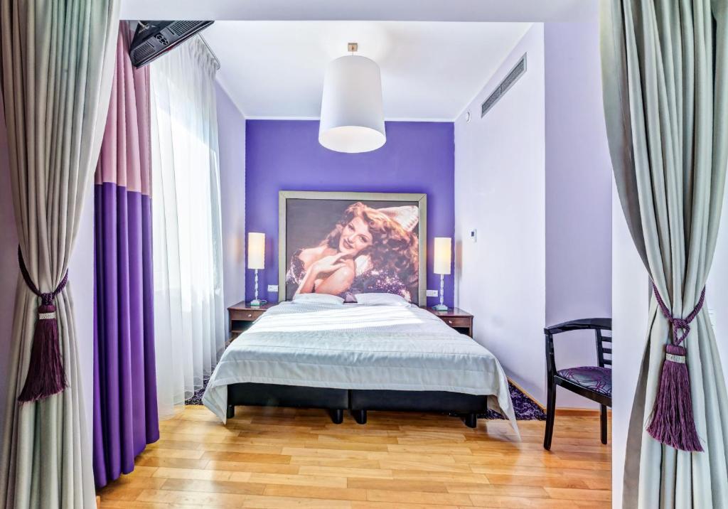 Ein Bett oder Betten in einem Zimmer der Unterkunft Don Prestige Residence