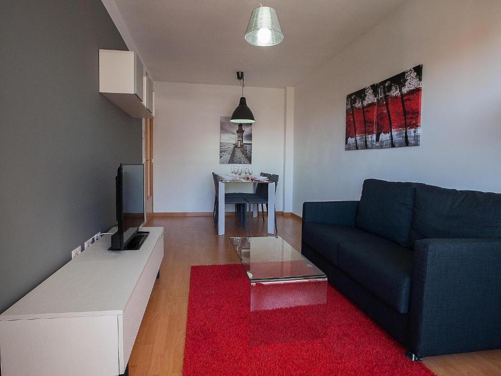 Televízia a/alebo spoločenská miestnosť v ubytovaní For a Stay Las Dunas