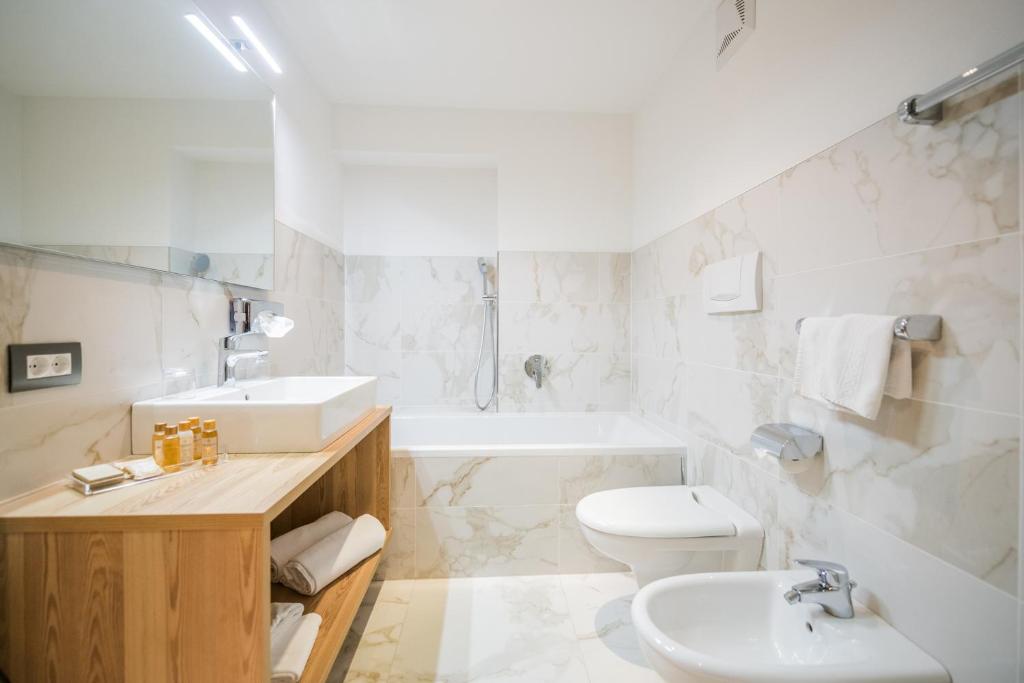 Kúpeľňa v ubytovaní Hotel Rodella