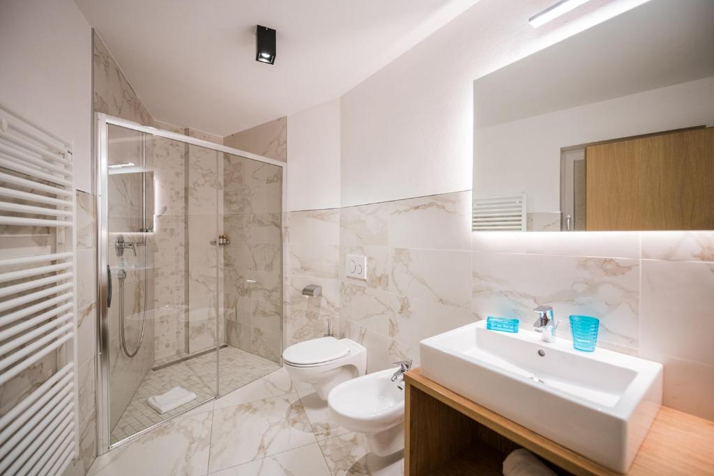 Kúpeľňa v ubytovaní Hotel Rodella