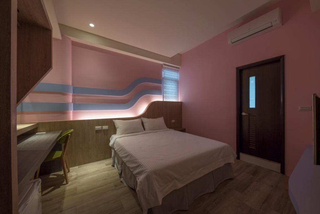 Postel nebo postele na pokoji v ubytování Finding Sea B&B Hall 2