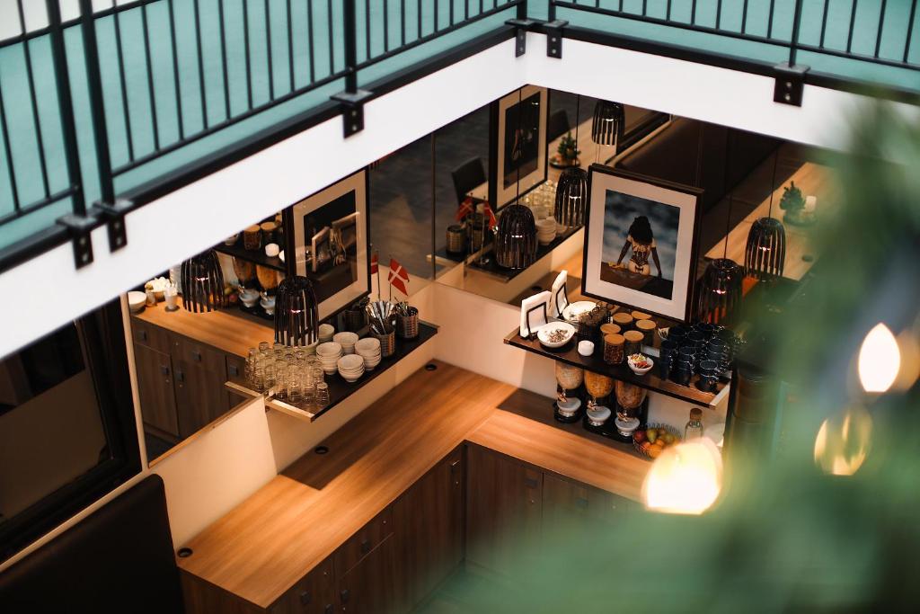 an overhead view of a bar in a house at Hotel Jomfru Ane in Aalborg