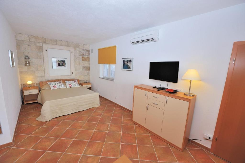 Posteľ alebo postele v izbe v ubytovaní Nautilus-Bay Apartments - Seaview Apartments 210, 211 - Villa Gorma