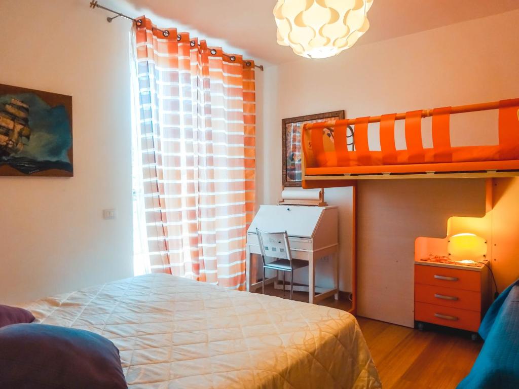 A bed or beds in a room at Guest House Le Acacie