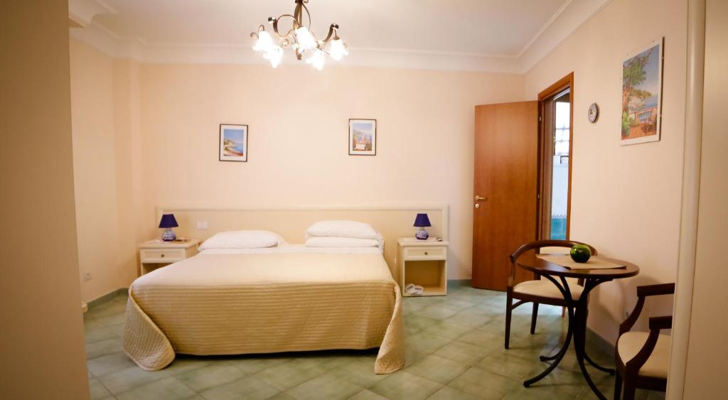 Postel nebo postele na pokoji v ubytování Casa Vacanze Vittoria