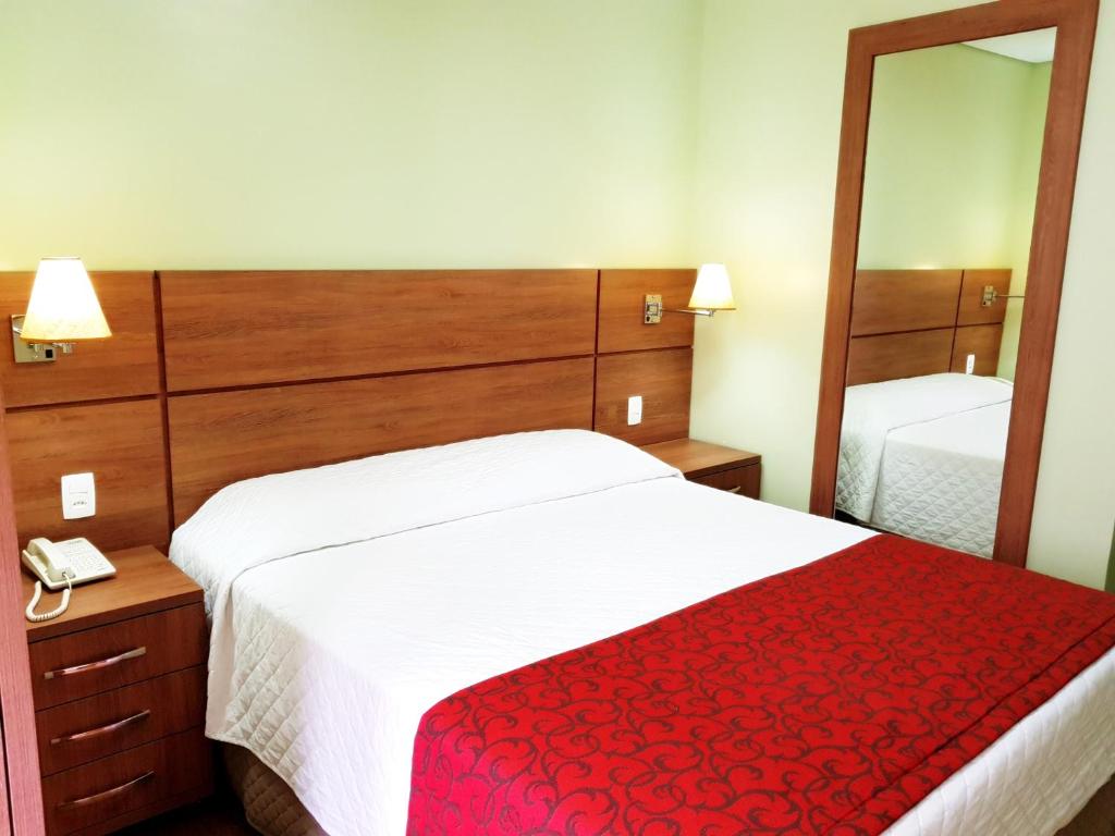 Postel nebo postele na pokoji v ubytování Hotel Pousada Clássica