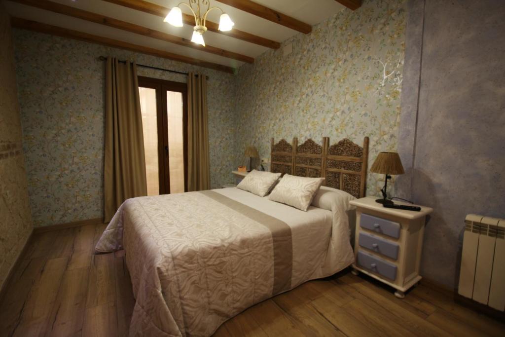 Posteľ alebo postele v izbe v ubytovaní Posada de Peregrinos