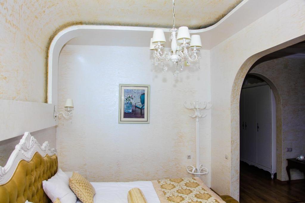 Postel nebo postele na pokoji v ubytování Iberia Palace Hotel