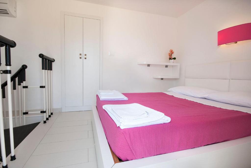 Postel nebo postele na pokoji v ubytování Hotel Beach Salento