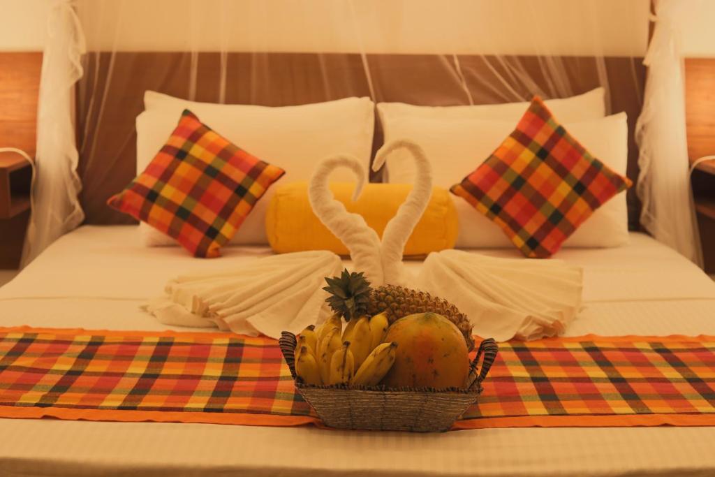 Postel nebo postele na pokoji v ubytování Beach Grove Villas