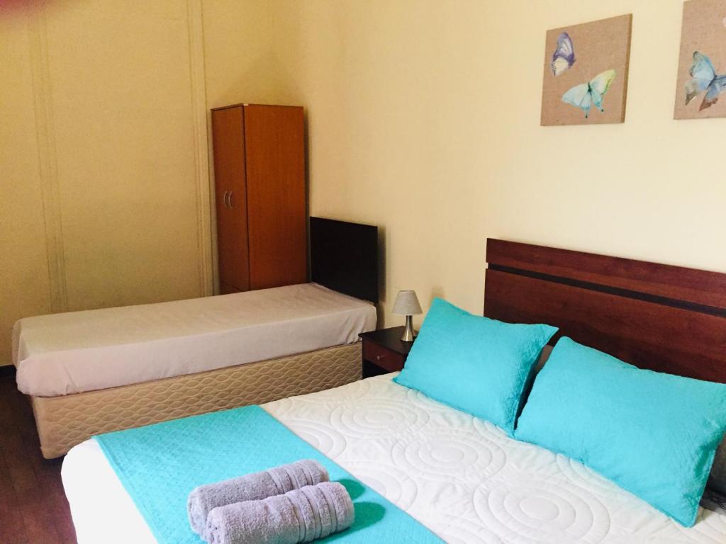Postel nebo postele na pokoji v ubytování Hostal Rama & CaStle