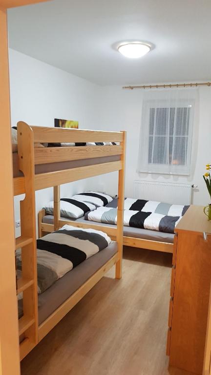 Postel nebo postele na pokoji v ubytování Apartmán Alfa 11