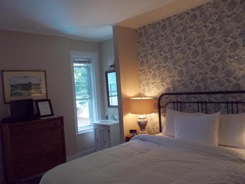 Postel nebo postele na pokoji v ubytování Seaway Manor B&B
