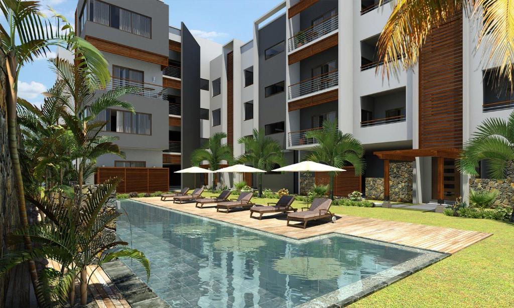 Πισίνα στο ή κοντά στο Flic en Flac Sea View Luxury 3 bedroom Apartment