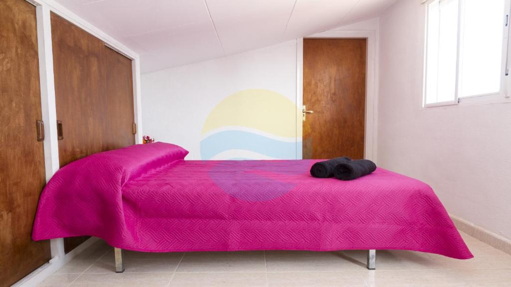 Posteľ alebo postele v izbe v ubytovaní Araceli - Chalet en Riumar con piscina privada, jardín y barbacoa - Deltavacaciones