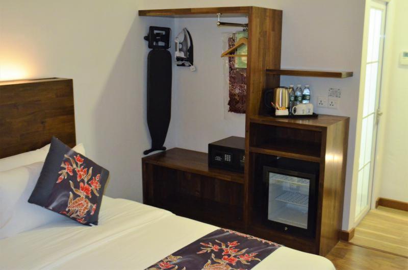 Postel nebo postele na pokoji v ubytování Serapi Hotel