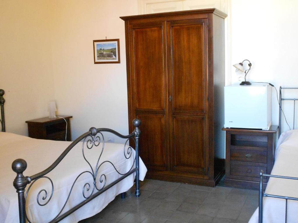 Posteľ alebo postele v izbe v ubytovaní Etna Wine Azienda Agrituristica