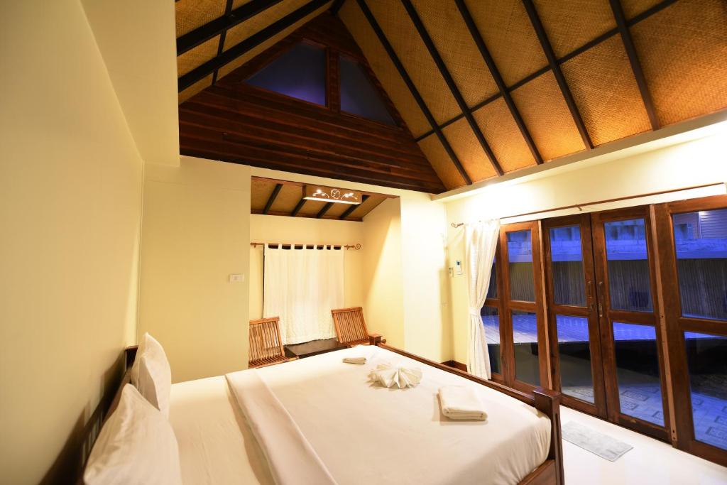 Postel nebo postele na pokoji v ubytování Chunut House Resort