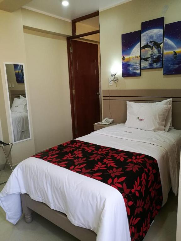 Postel nebo postele na pokoji v ubytování Hotel Spa Machupicchu