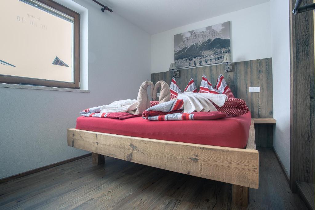 Posteľ alebo postele v izbe v ubytovaní Chalet Holzerstubn