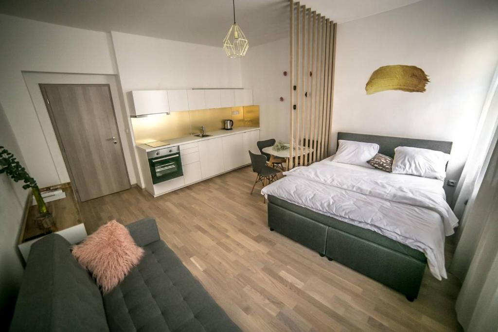 Кровать или кровати в номере Prague friendly apartments in Prague