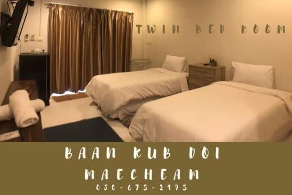 Postel nebo postele na pokoji v ubytování Baan Kub Doi Mae Chaem