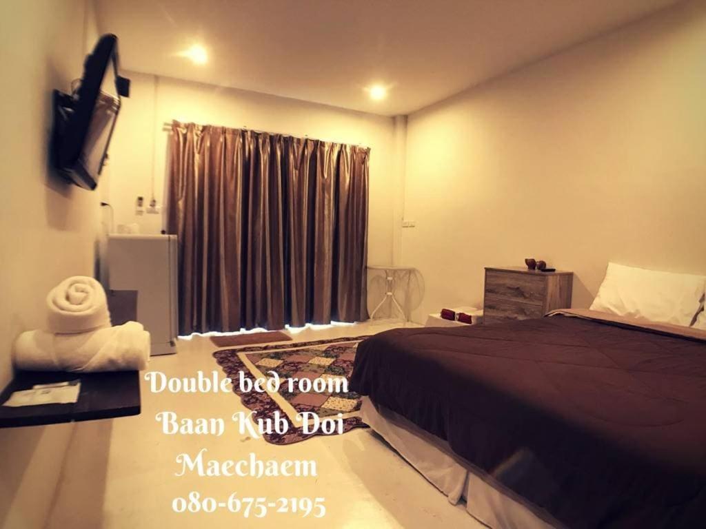 Postel nebo postele na pokoji v ubytování Baan Kub Doi Mae Chaem