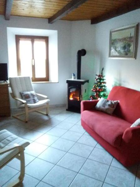 A seating area at Appartamento La Volpe