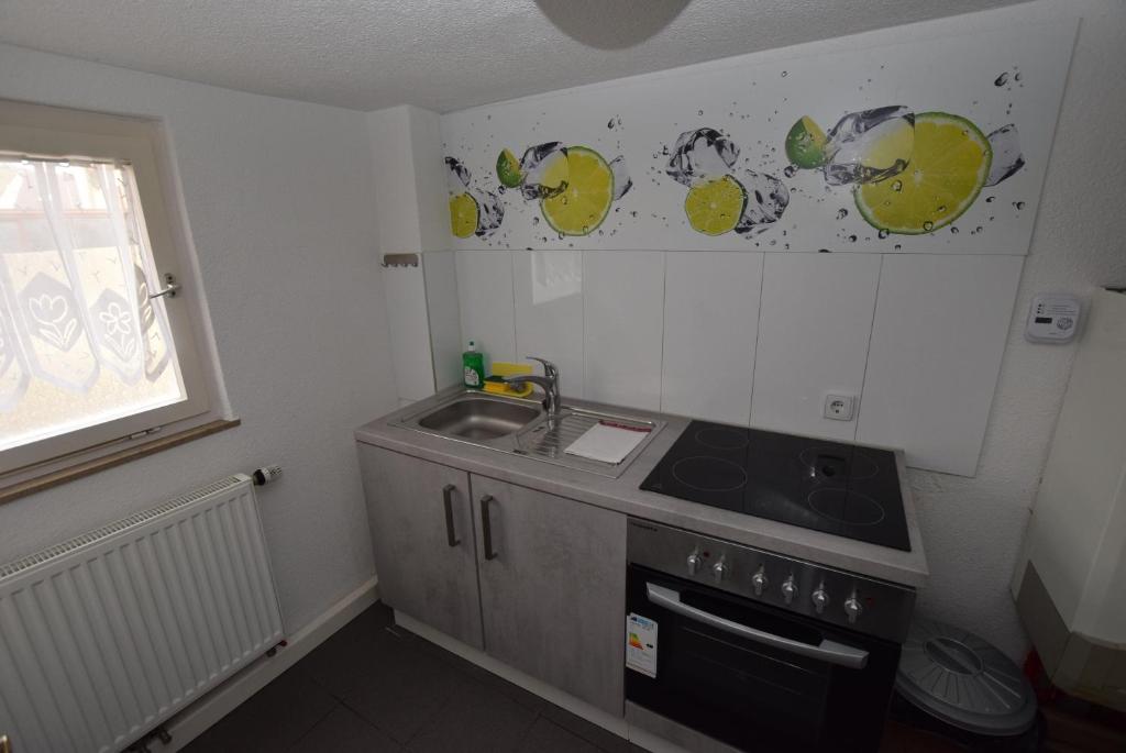 Kuchyň nebo kuchyňský kout v ubytování AB Apartment Objekt 27