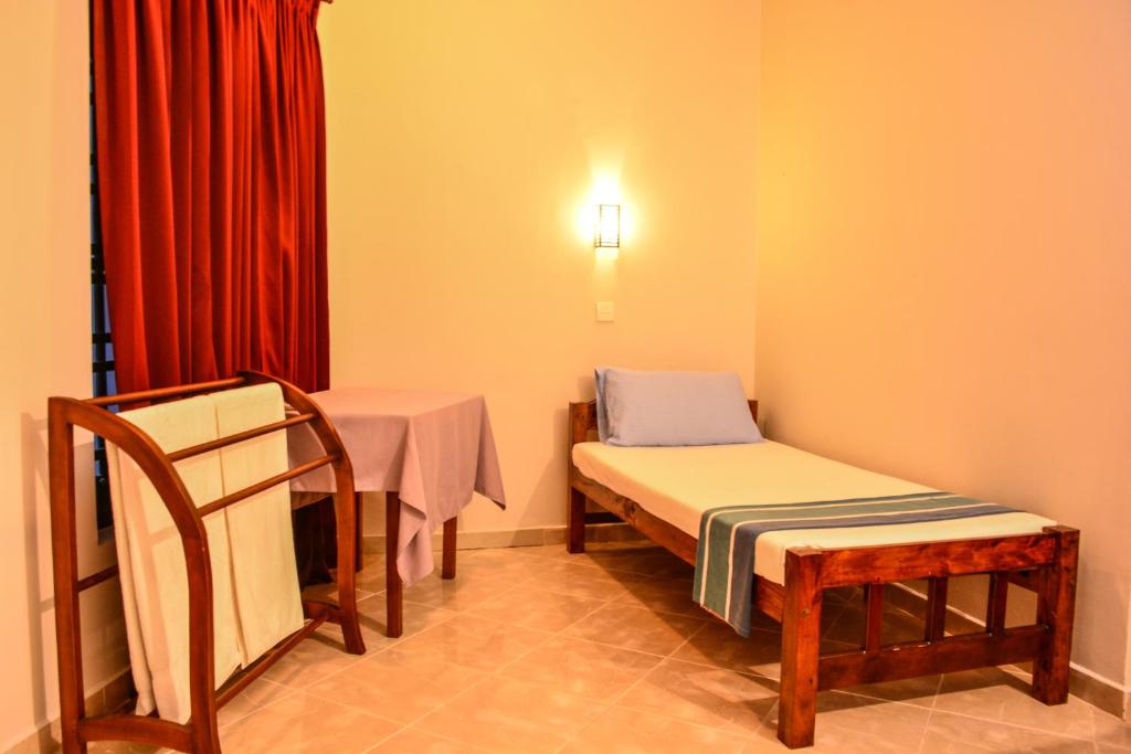 Katil atau katil-katil dalam bilik di Hotel Apollo