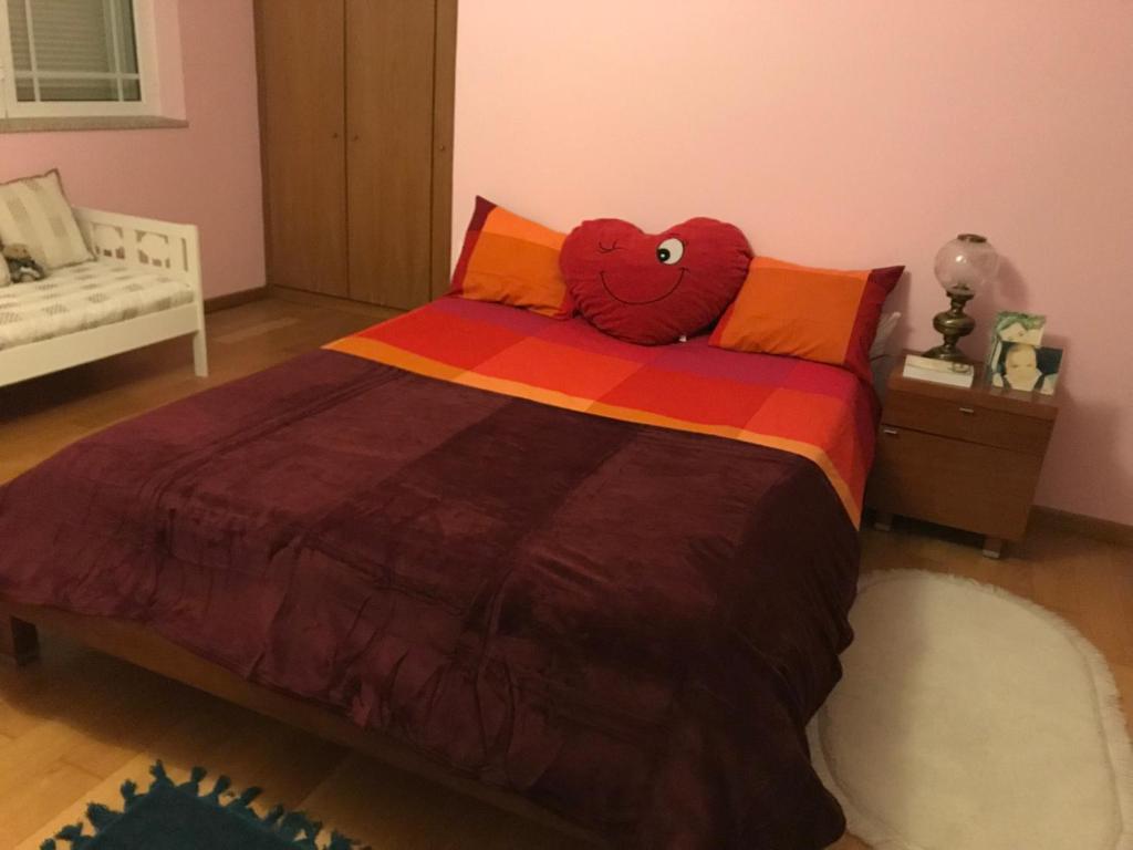 Postel nebo postele na pokoji v ubytování Casa do eirô