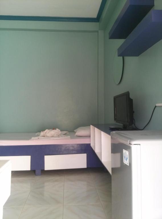 Letto o letti in una camera di Bambooze Hauz