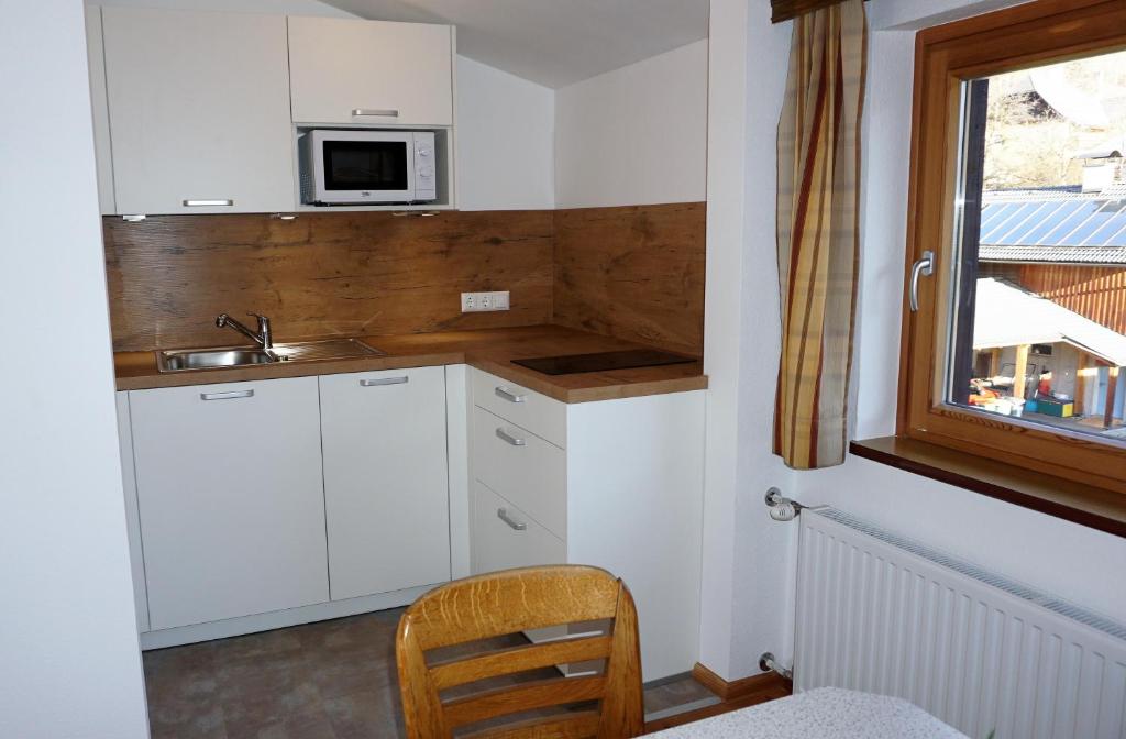 Kuchyň nebo kuchyňský kout v ubytování Gästehaus Hubertus