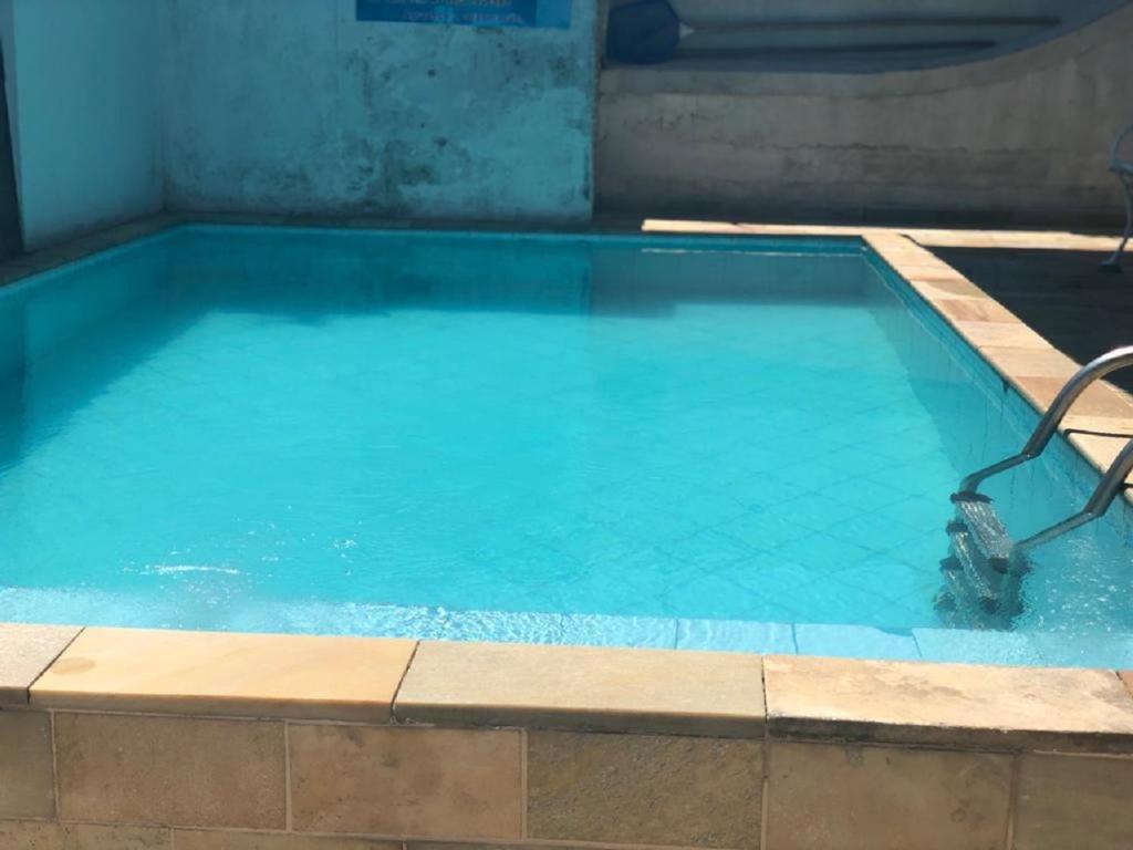  No Centro com Piscina Aquecida