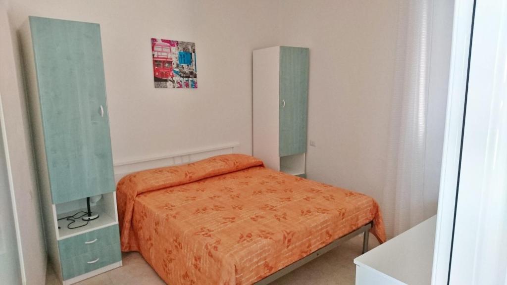 Łóżko lub łóżka w pokoju w obiekcie LA CASA AL MARE a Peschici