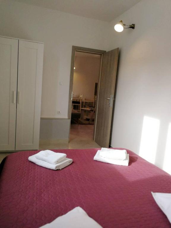 Postel nebo postele na pokoji v ubytování Apartman Unka