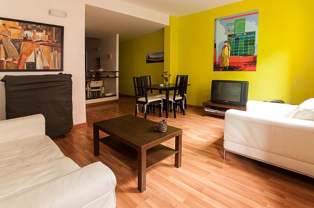 Posezení v ubytování Céntrico y tranquilo apartamento con WIFI