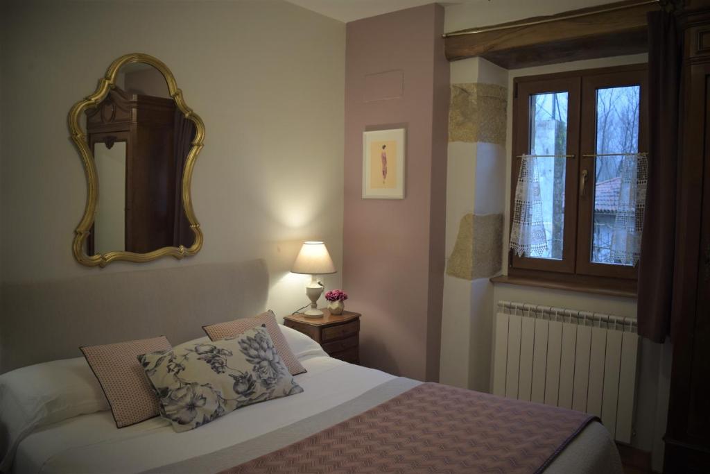 Posteľ alebo postele v izbe v ubytovaní Anikuenea Apartamento Goienta