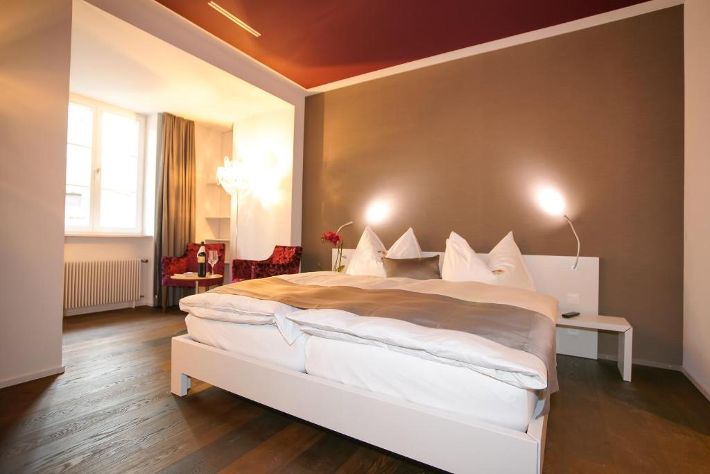 Postel nebo postele na pokoji v ubytování Boutique Hotel - Restaurant Orchidee